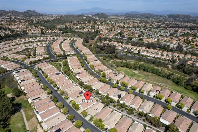 birds eye view of property with a residential view and a mountain view