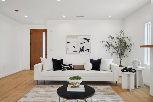 5449 S Victoria Ave, Los Angeles, CA 90043 - living room with wood finished floors, recessed lighting, and baseboards