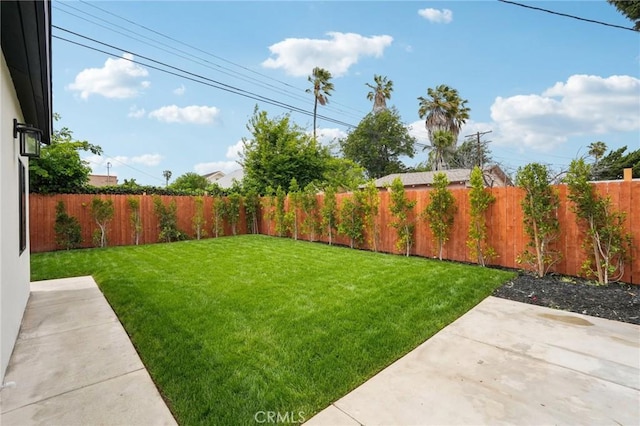5449 S Victoria Ave, Los Angeles, CA 90043 - view of yard featuring a patio and a fenced backyard