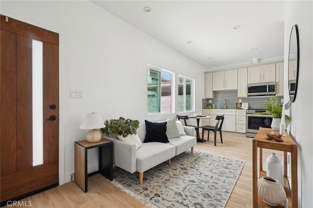 5449 S Victoria Ave, Los Angeles, CA 90043 - living area featuring light wood-type flooring