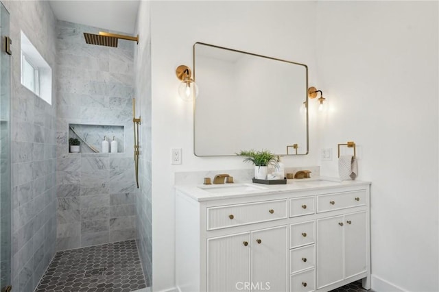 5449 S Victoria Ave, Los Angeles, CA 90043 - bathroom with double vanity, a sink, baseboards, and tiled shower