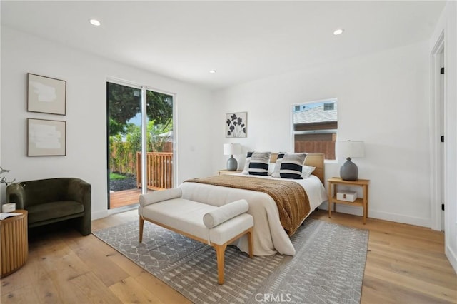 5449 S Victoria Ave, Los Angeles, CA 90043 - bedroom with recessed lighting, access to exterior, baseboards, and light wood-style floors