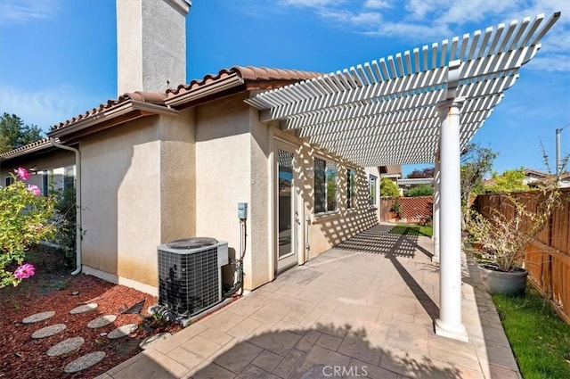 view of patio featuring a fenced backyard, a pergola, and central air condition unit