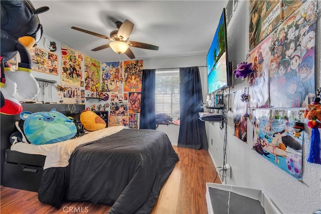 37025 96th St E, Littlerock, CA 93543 - bedroom with ceiling fan and wood finished floors