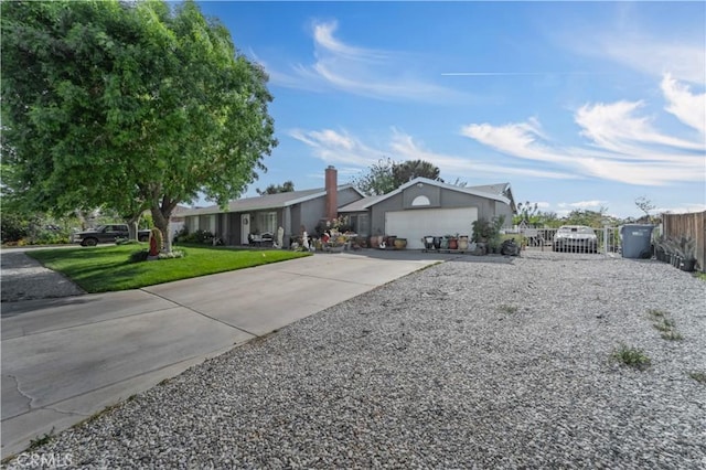 37025 96th St E, Littlerock, CA 93543 - single story home with a front yard, driveway, an attached garage, and fence
