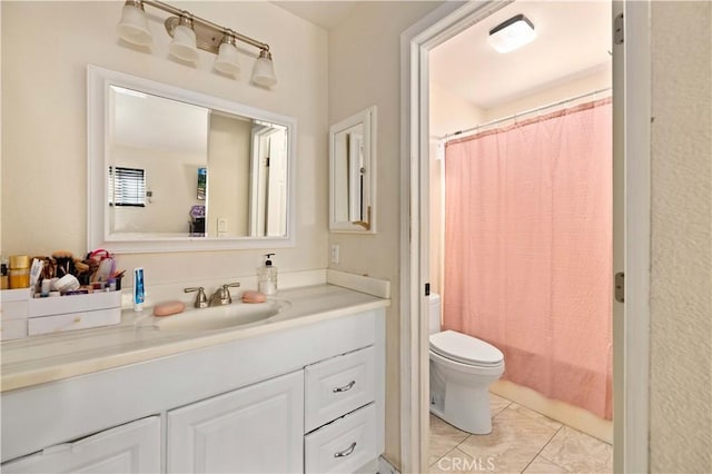 bathroom featuring toilet, shower / bath combination with curtain, and vanity