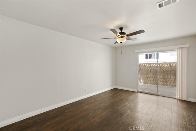13139 Kiowa Dr, Moreno Valley, CA 92553 - empty room with dark wood finished floors, ceiling fan, and baseboards