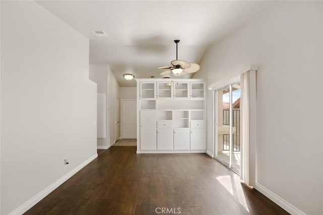 13139 Kiowa Dr, Moreno Valley, CA 92553 - unfurnished dining area with dark wood-style floors, lofted ceiling, ceiling fan, and baseboards