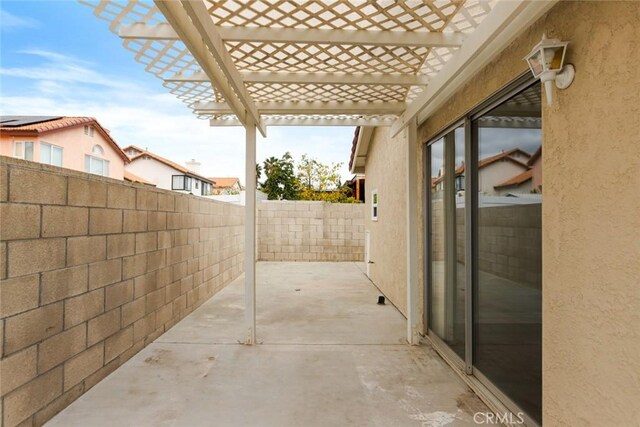 13139 Kiowa Dr, Moreno Valley, CA 92553 - view of patio / terrace with a fenced backyard and a pergola