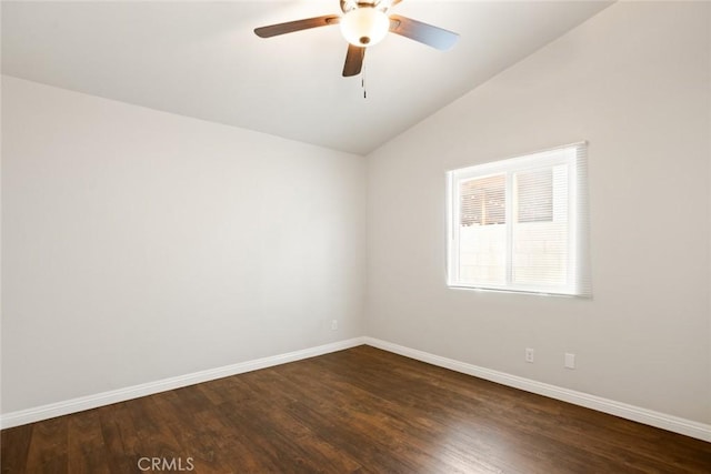 13139 Kiowa Dr, Moreno Valley, CA 92553 - unfurnished room featuring baseboards, vaulted ceiling, a ceiling fan, and dark wood-style flooring