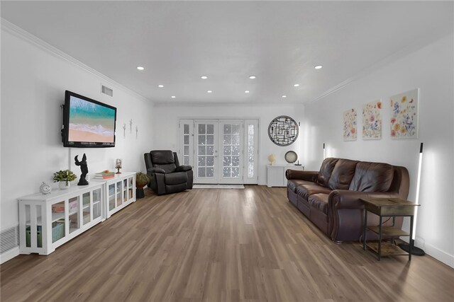 649 Sycamore Ave, Claremont, CA 91711 - living area with crown molding, wood finished floors, recessed lighting, french doors, and baseboards