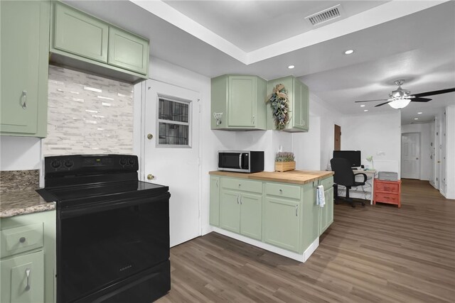 649 Sycamore Ave, Claremont, CA 91711 - kitchen with green cabinetry, black / electric stove, stainless steel microwave, and recessed lighting