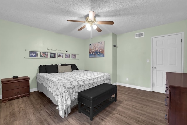649 Sycamore Ave, Claremont, CA 91711 - bedroom featuring dark wood-style floors, a textured ceiling, baseboards, and ceiling fan