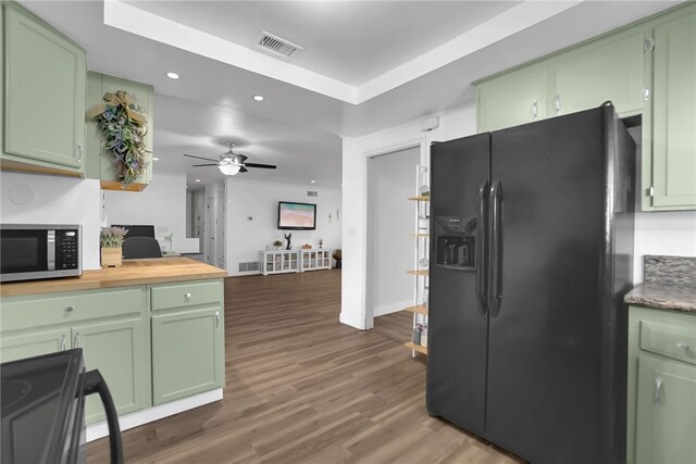 649 Sycamore Ave, Claremont, CA 91711 - kitchen with black appliances, green cabinets, wood finished floors, and recessed lighting