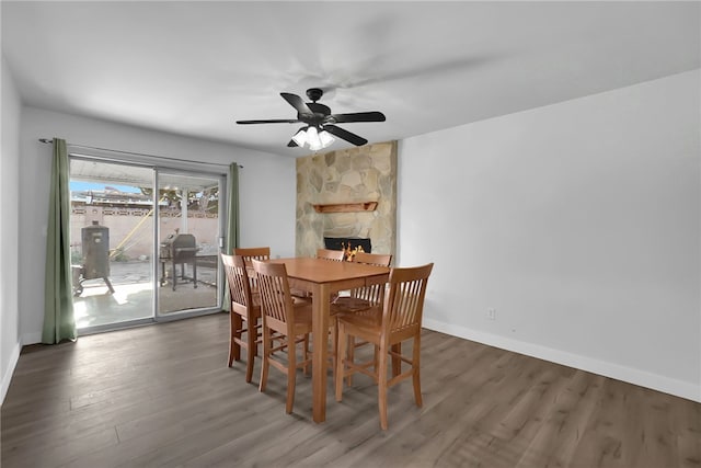 649 Sycamore Ave, Claremont, CA 91711 - dining space featuring wood finished floors, ceiling fan, a fireplace, and baseboards