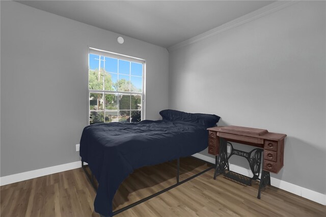 649 Sycamore Ave, Claremont, CA 91711 - bedroom with crown molding, baseboards, and wood finished floors