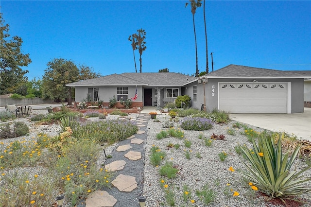 649 Sycamore Ave, Claremont, CA 91711 - single story home with stucco siding, an attached garage, concrete driveway, and a shingled roof