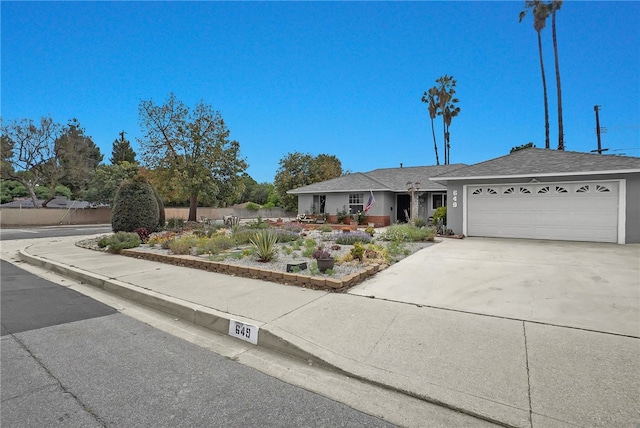 649 Sycamore Ave, Claremont, CA 91711 - ranch-style house featuring a garage, driveway, and stucco siding