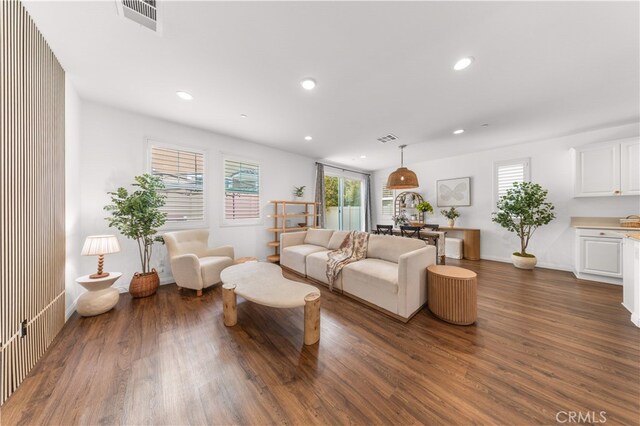 16005 Blueberry Ave, Chino, CA 91708 - living area featuring dark wood finished floors, visible vents, baseboards, and recessed lighting