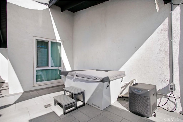 view of patio / terrace featuring a hot tub