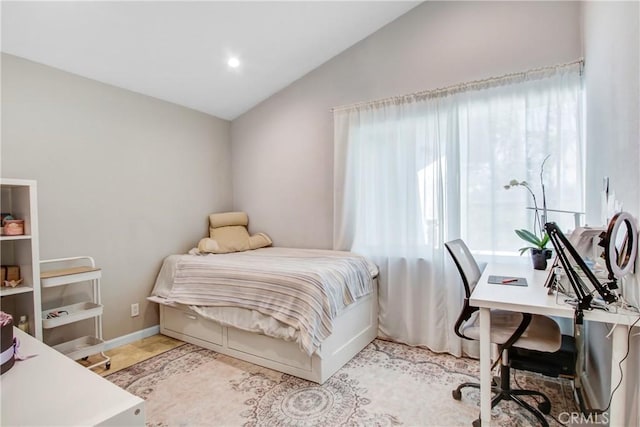 bedroom featuring recessed lighting and vaulted ceiling