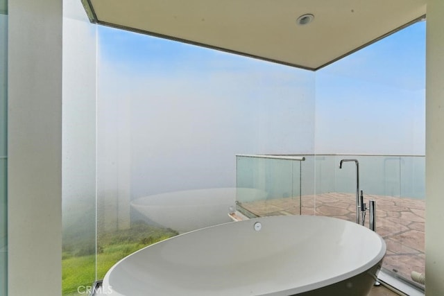 bathroom with a freestanding bath