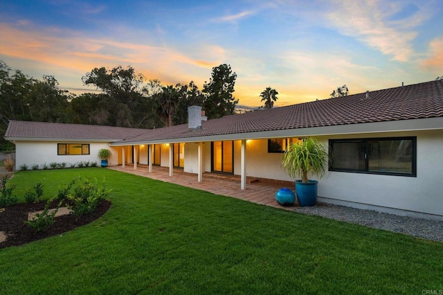 14980 Via De La Valle, Del Mar, CA 92014 - back of house with a patio, stucco siding, a chimney, a yard, and a tile roof