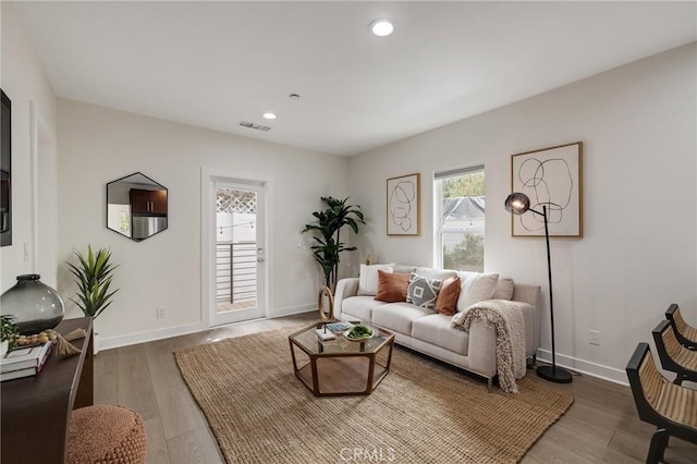 724 San Miguel Ave, Venice, CA 90291 - living area with wood finished floors, visible vents, recessed lighting, and baseboards