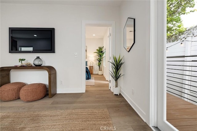 724 San Miguel Ave, Venice, CA 90291 - corridor featuring baseboards and wood finished floors