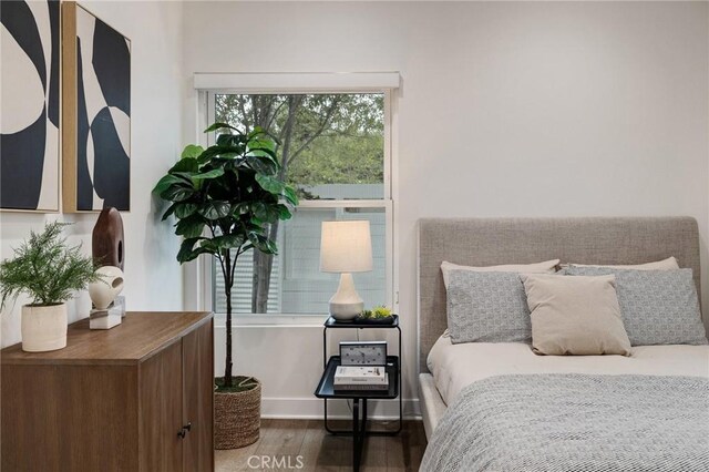 724 San Miguel Ave, Venice, CA 90291 - bedroom featuring baseboards and wood finished floors