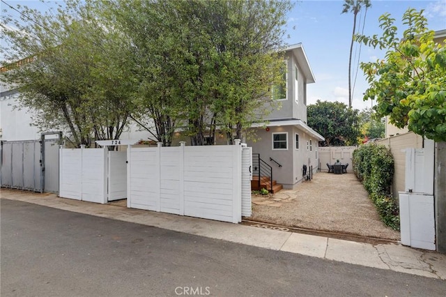 724 San Miguel Ave, Venice, CA 90291 - view of front of home featuring fence and stucco siding