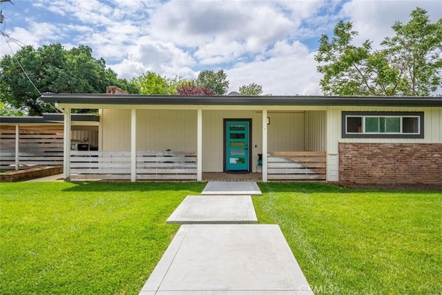8051 Los Altos Dr, Los Molinos, CA 96055 - property entrance featuring brick siding