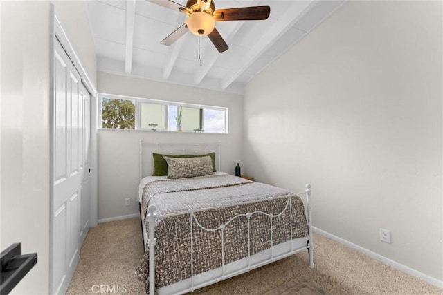 8051 Los Altos Dr, Los Molinos, CA 96055 - bedroom with a closet, vaulted ceiling with beams, a ceiling fan, baseboards, and carpet floors