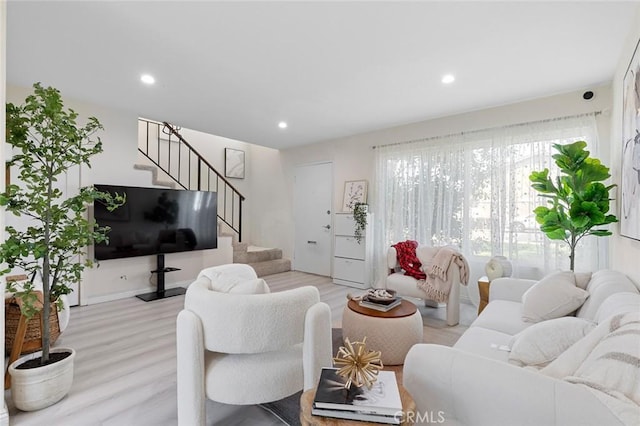8482 Benjamin Dr Unit 10, Huntington Beach, CA 92647 - living area with recessed lighting, wood finished floors, and stairway