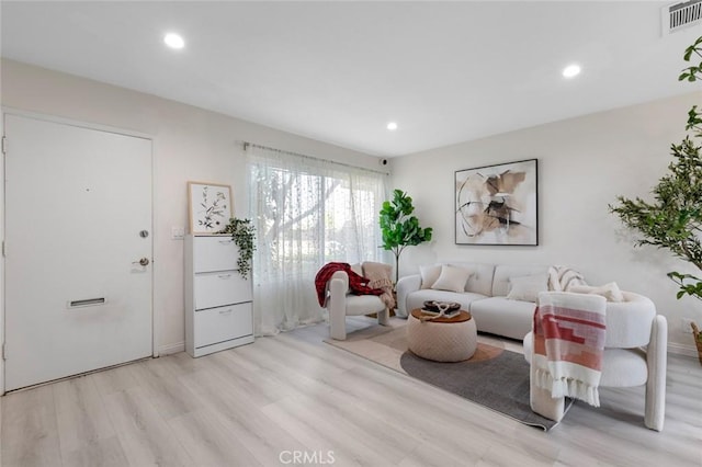 8482 Benjamin Dr Unit 10, Huntington Beach, CA 92647 - living area with recessed lighting, light wood finished floors, and visible vents
