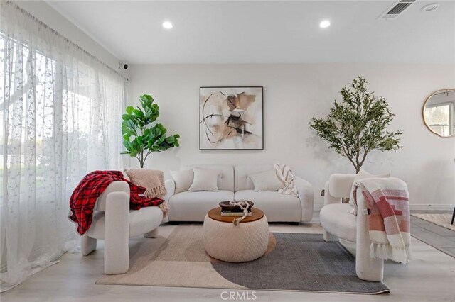 8482 Benjamin Dr Unit 10, Huntington Beach, CA 92647 - living area featuring recessed lighting, visible vents, and wood finished floors