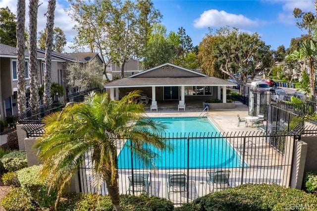 8482 Benjamin Dr Unit 10, Huntington Beach, CA 92647 - pool featuring a patio and fence