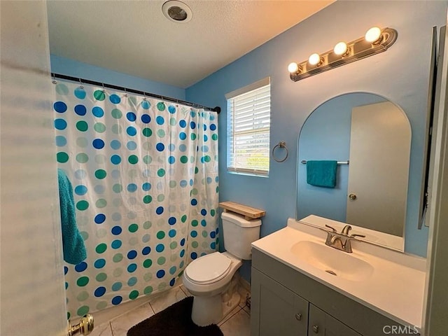 39557 Warbler Dr, Temecula, CA 92591 - bathroom featuring toilet, tile patterned floors, vanity, curtained shower, and a textured ceiling