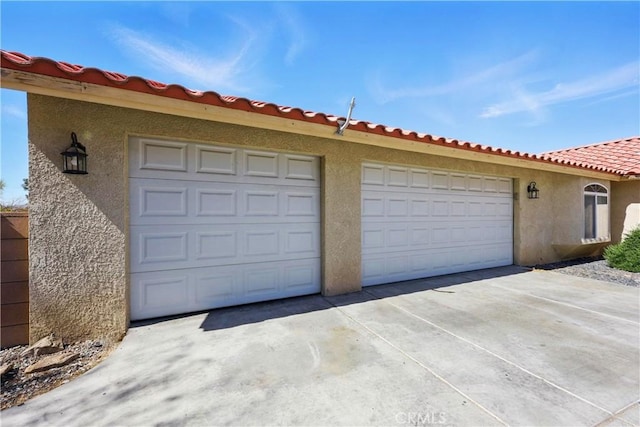 garage with driveway
