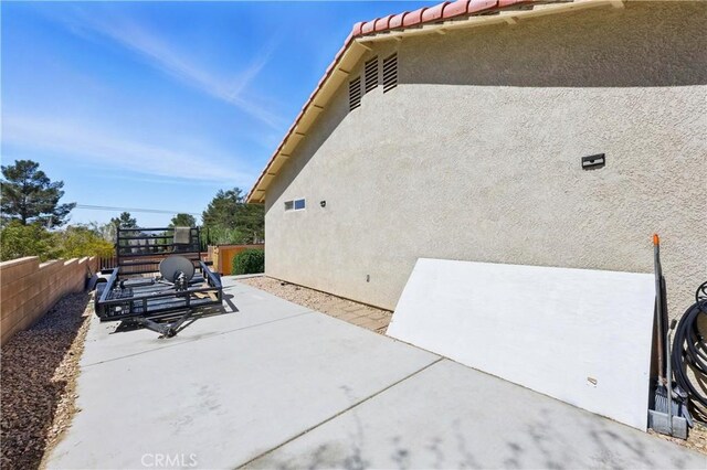 view of patio with fence