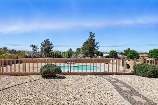 view of pool with fence, a fenced in pool, and a patio area