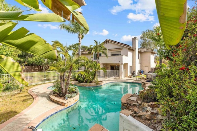 view of pool with a patio, fence, and a fenced in pool