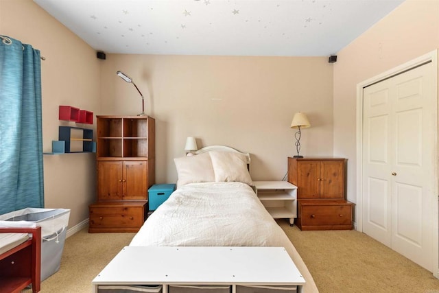 bedroom with light carpet