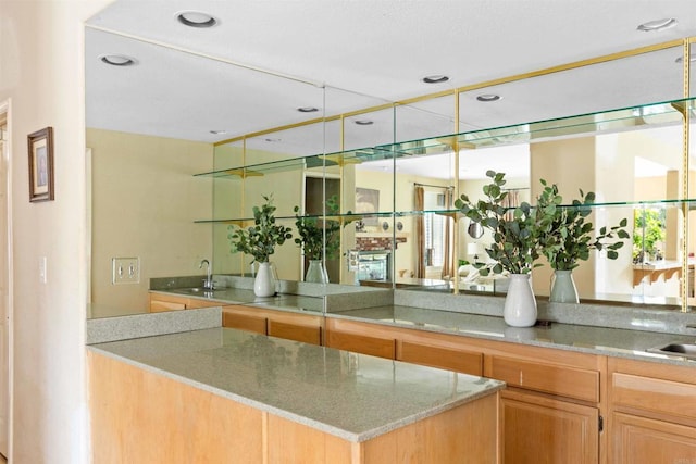 bar with recessed lighting and a sink