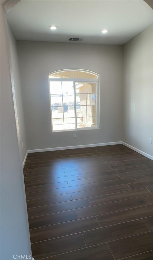 17995 Seaforth St, Hesperia, CA 92345 - empty room with wood tiled floors and recessed lighting