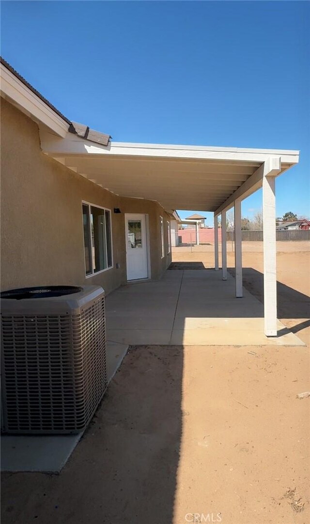 view of patio featuring central air condition unit