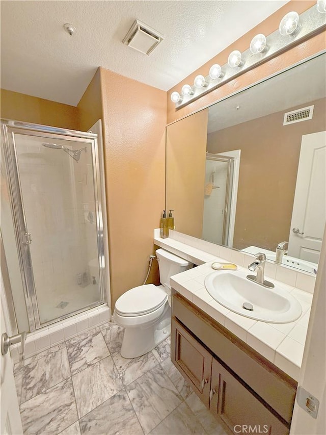 full bath with toilet, visible vents, and a shower stall