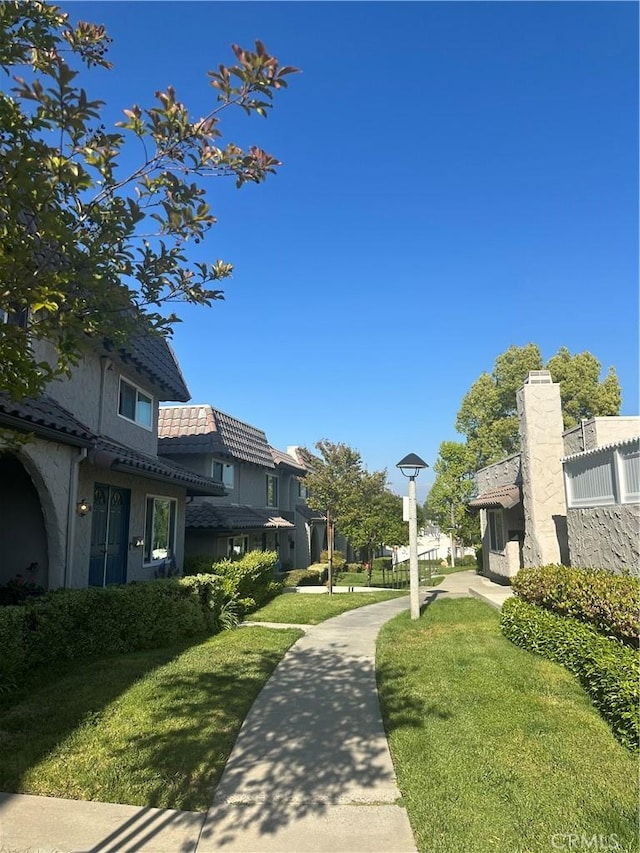 25260 Avenida Dorena, Newhall, CA 91321 - view of property's community with a yard and a residential view