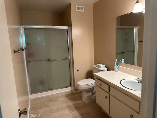 25260 Avenida Dorena, Newhall, CA 91321 - full bath featuring vanity, toilet, a stall shower, visible vents, and baseboards