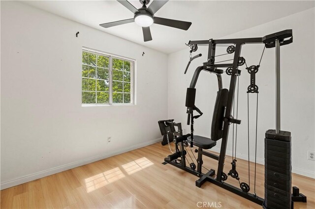 1555 Berkshire Dr, Palmdale, CA 93551 - workout room featuring baseboards, a ceiling fan, and wood finished floors